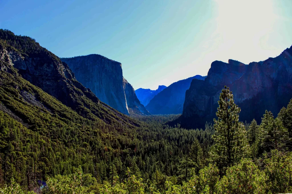 Tunnel View in Yosemite National Park, showcasing a panoramic vista of El Capitan, Half Dome, and Bridalveil Fall.
